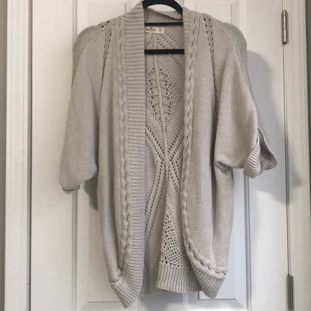 A tan Hollister cardigan